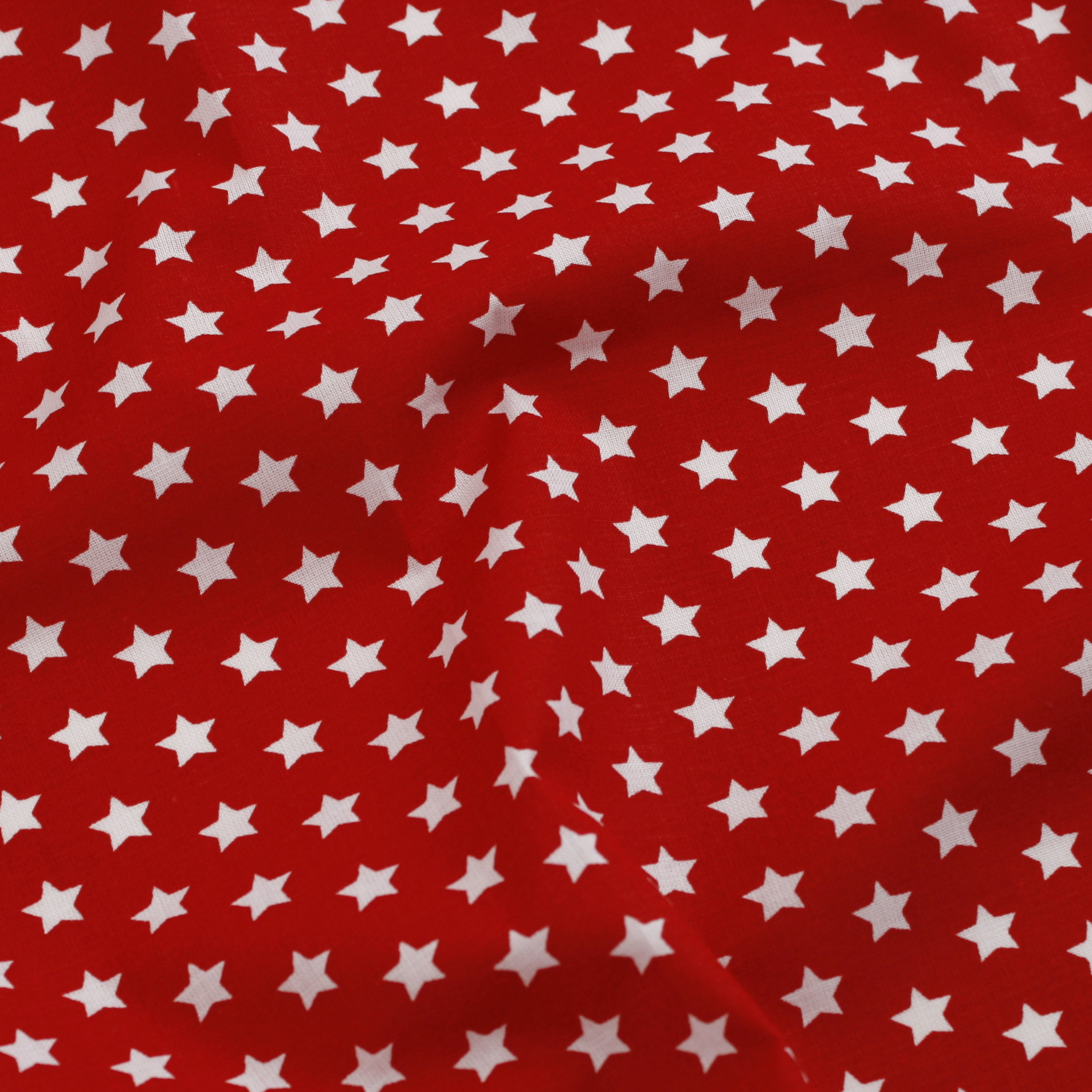 Stoff Meterware Sterne Weiß auf Rot