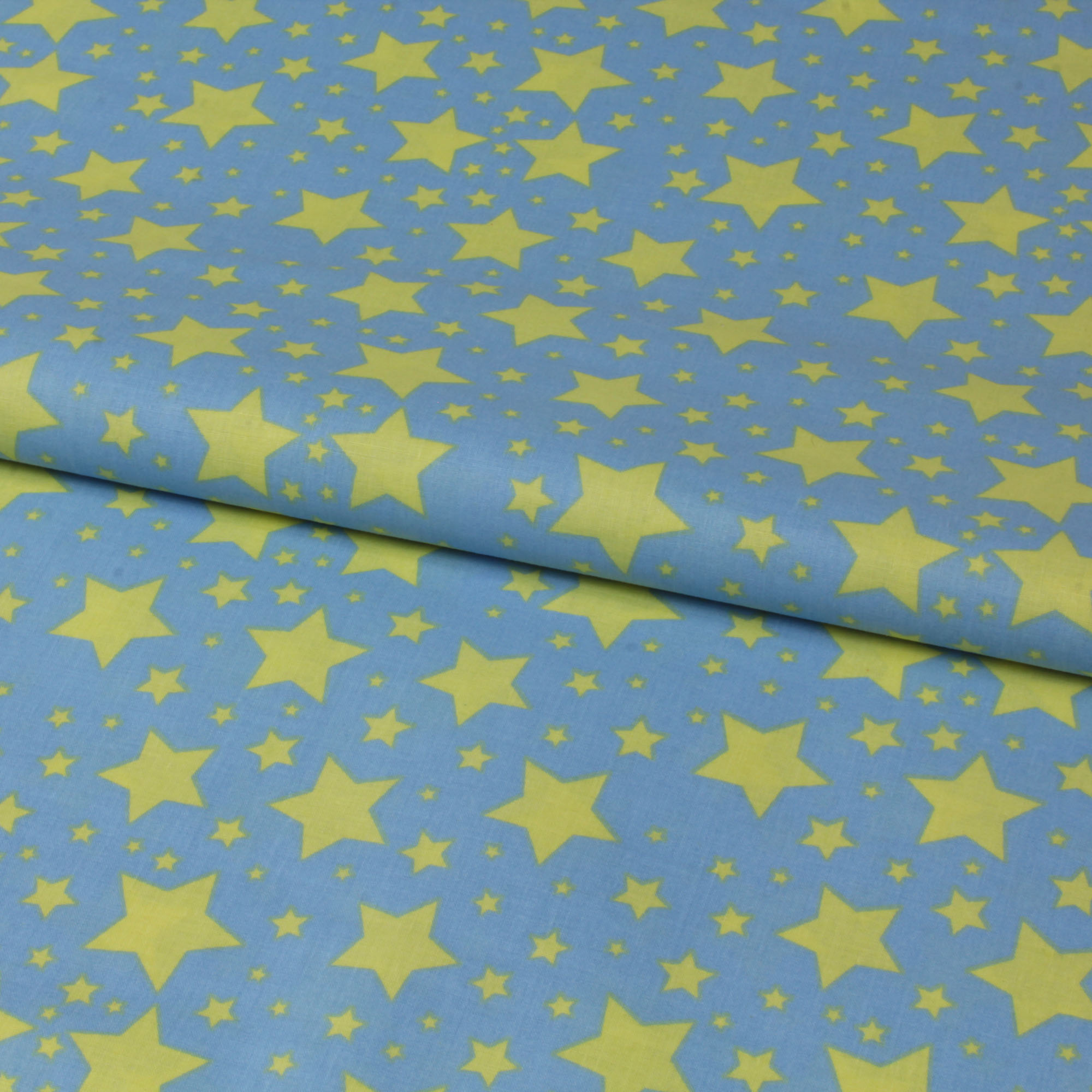 Stoff Meterware Gelbe Sterne auf Hellblau Baumwolle